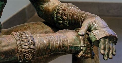 did roman boxing gloves have metal inserts|ancient greek boxing gloves.